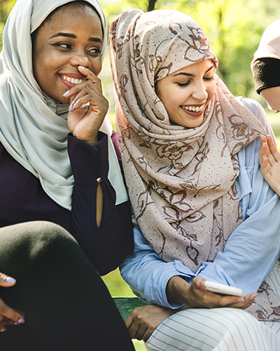 Islamic women friends talking and having fun